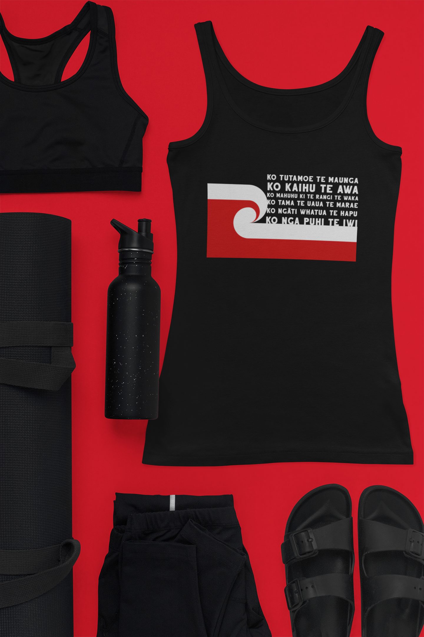 Collection of gym items including a custom pepeha tee by Mana Ake